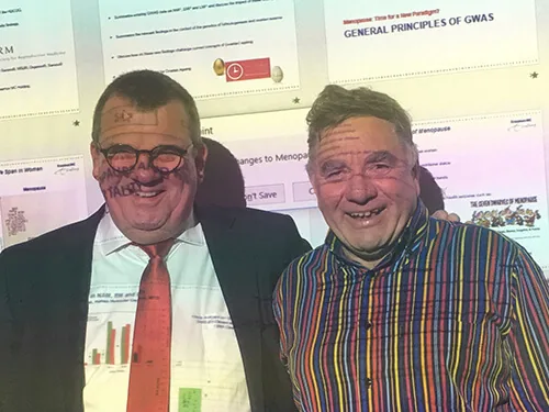 ANZSREI President Prof Michael Chapman with Prof Joop Laven in front of a conference poster